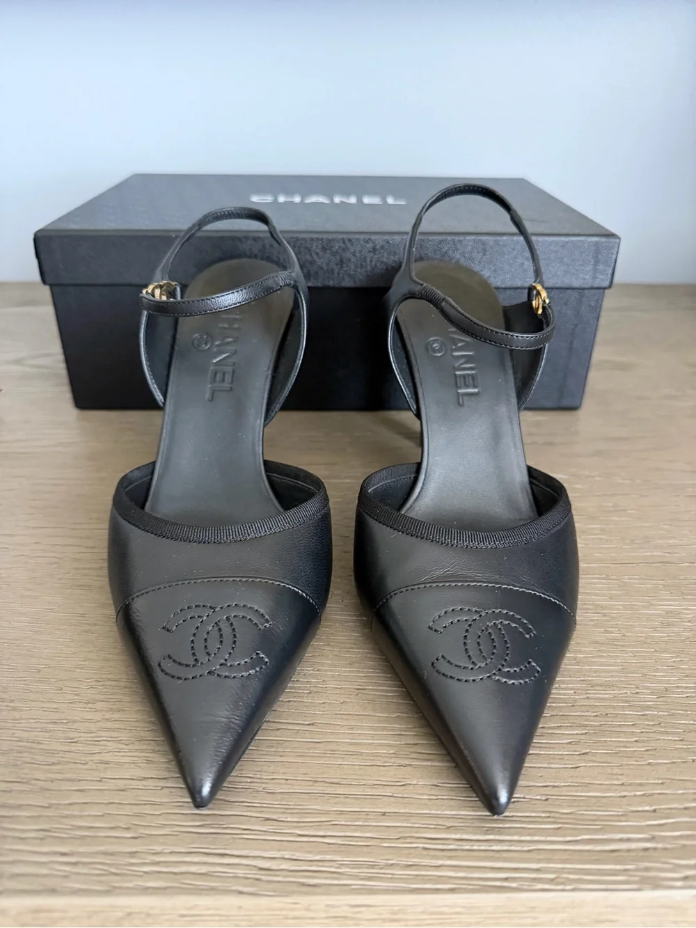 CHANEL Black Leather Pointed Slingback Heels with Gold CC Accent